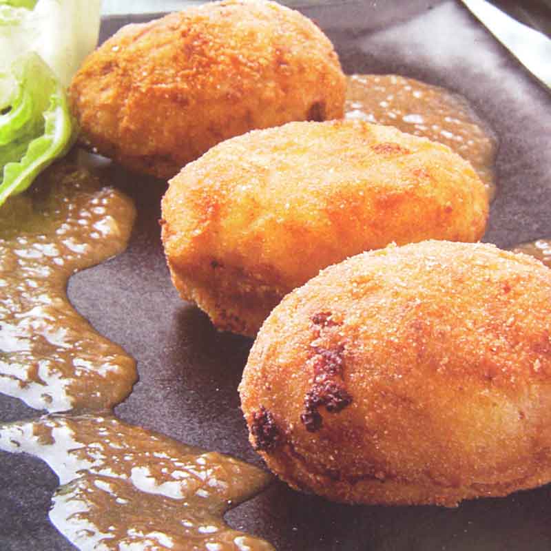 Huevos rebozados rellenos de jamón